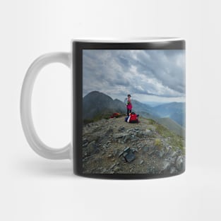 Hiker on a mountain trail Mug